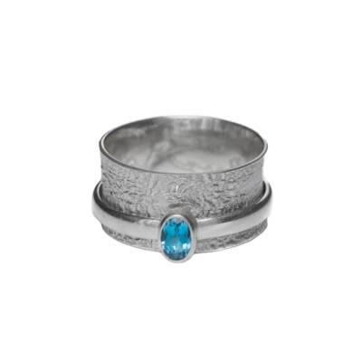 Blue Topaz Serenity Spinner Ring Irish jewellery ethically handcrafted in sterling silver by Caraliza Designs